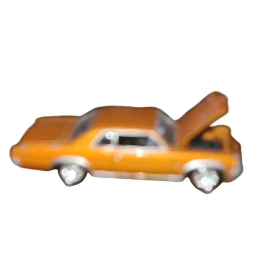 1964 PONTIAC GTO COLLECTIBLE 1/64 SCALE LIMITED EDITION TRI-POWER MUSCLE ORANGE